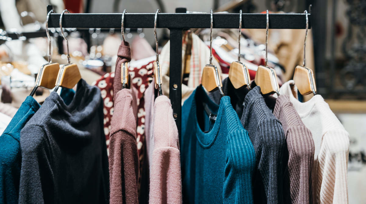 fashion clothing on hangers at the show